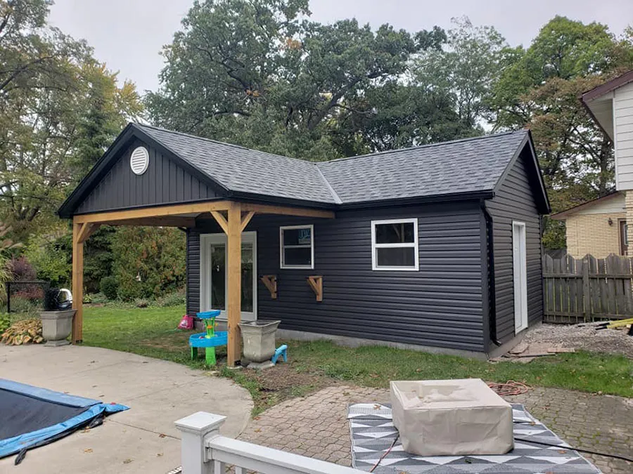 Downspout fitting and adjustment — Snow Siding & Eavestroughs, Sarnia ON